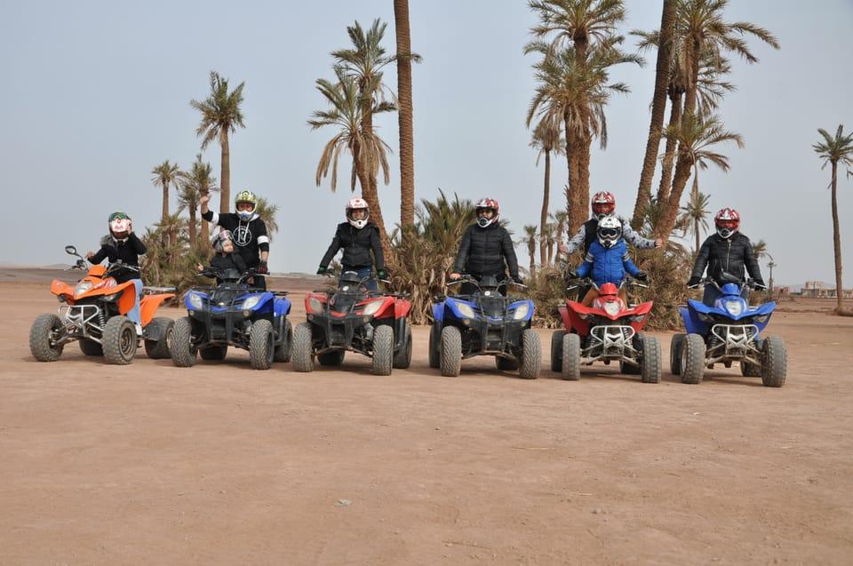 poeple in quad bikes in marrakech palmeraie